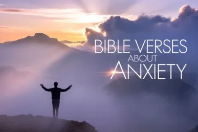 Person standing peacefully at mountain sunrise with arms raised in surrender, with the text 'Bible Verses About Anxiety' displayed in elegant typography against a dramatic dawn sky