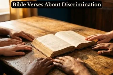 Diverse hands resting together on an open Bible in warm golden light, representing unity from Bible verses about discrimination.